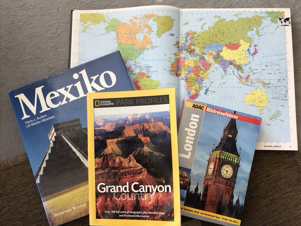 You can see a picture with different travel books on them.